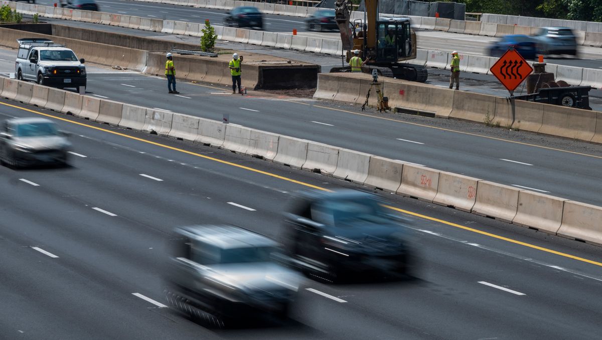 cars speeding on a highway